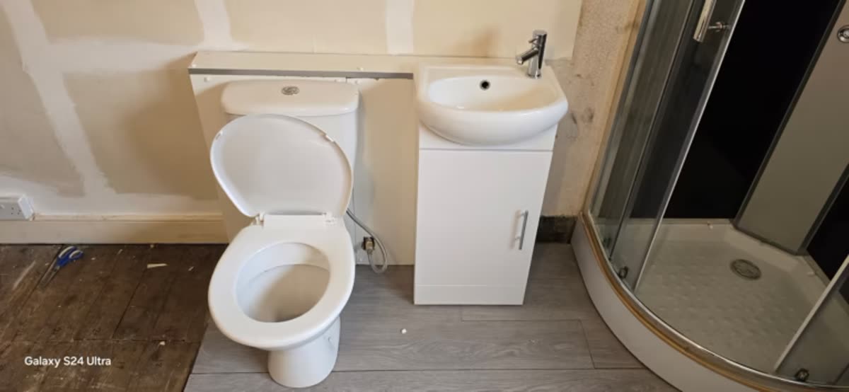 Bathroom renovation in progress with new tray and screen fitted