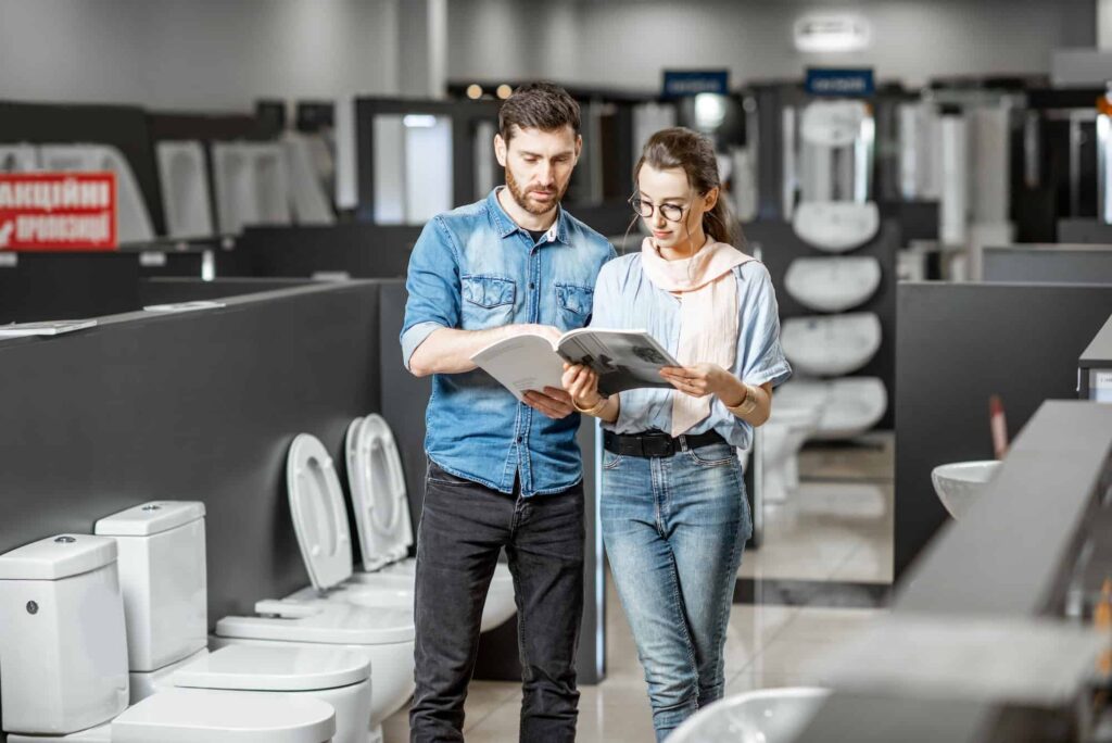 Sheffield customers choosing bathroom ceramics in a plumbing showroom