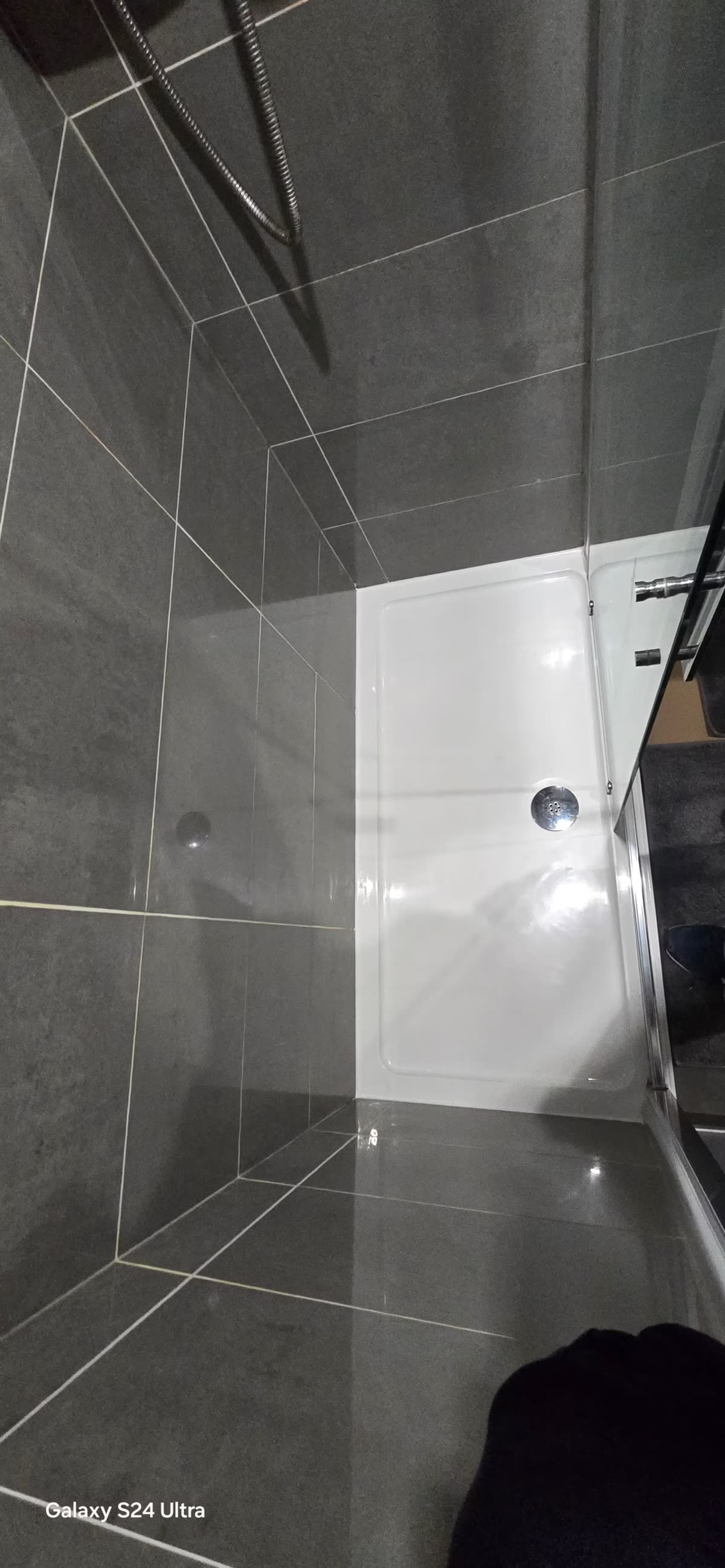 Completed walk-in shower tray and tiled floor after renovation